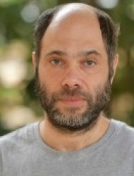 כ