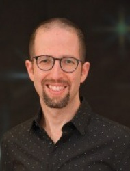 כ